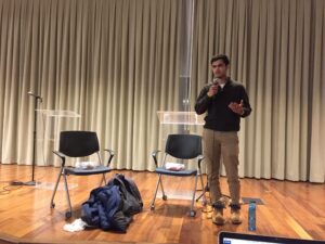 Anirudha Vaddadi, translator for Hot Chick and Chicken Madness, answers a question from campus media./Photo: Margaret Gach