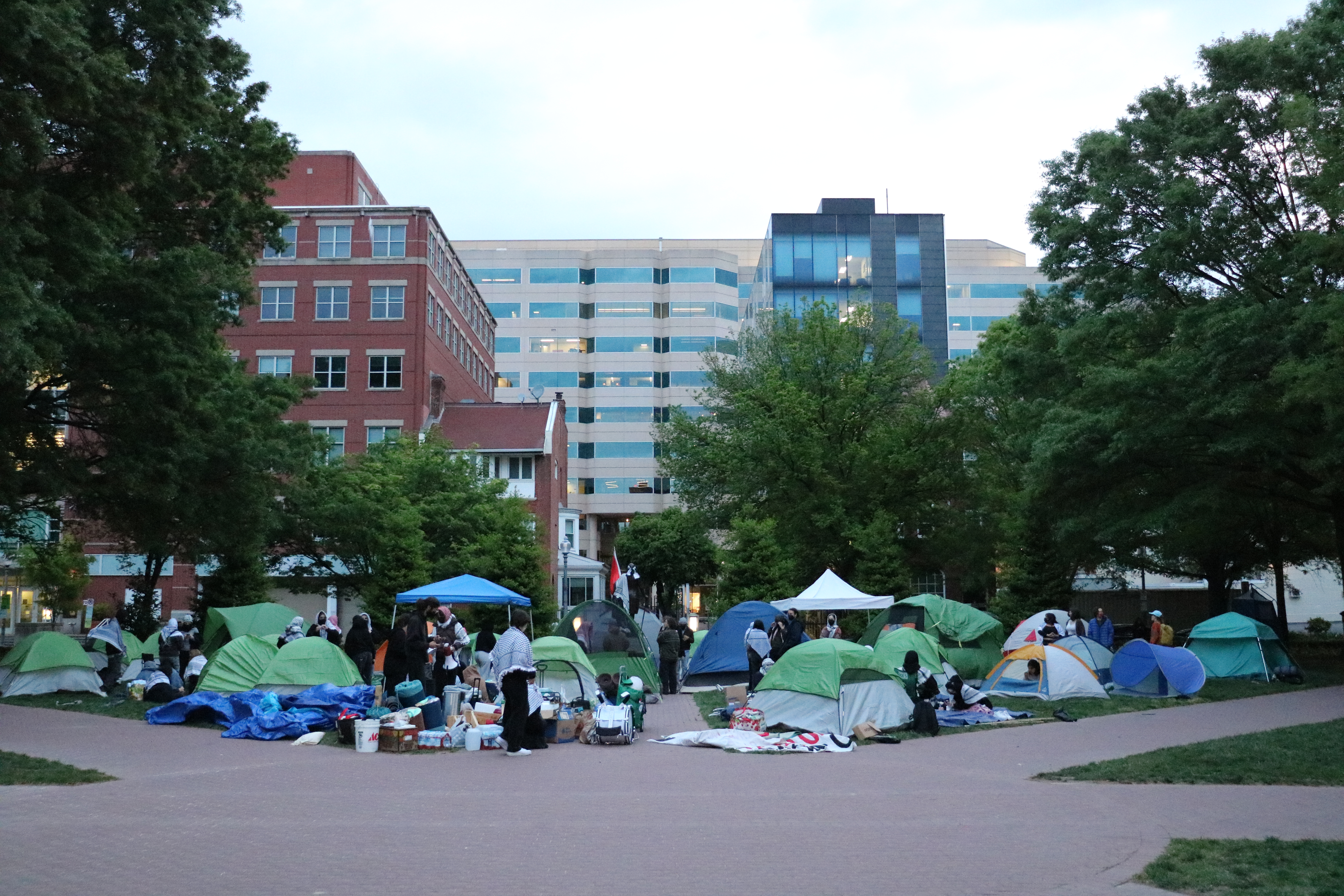 The sun rises at GW as student protesters finish setting up the tent encampment.